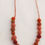 Thumbnail: Terracotta & Autumn Tones Felted Beads and cotton necklace