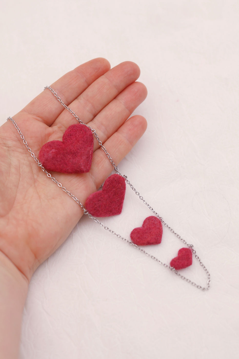 Thumbnail: 4 Felted Merino Wool Hearts long Necklace (Raspberry)