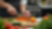 High angle view of a person preparing a healthy meal with vegetables and grains