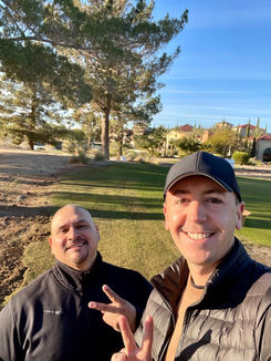 two people taking selfie at park