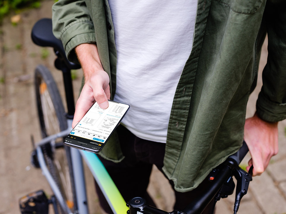 mockuuups-holding-samsung-s20-mockup-in-front-of-a-bike.jpeg