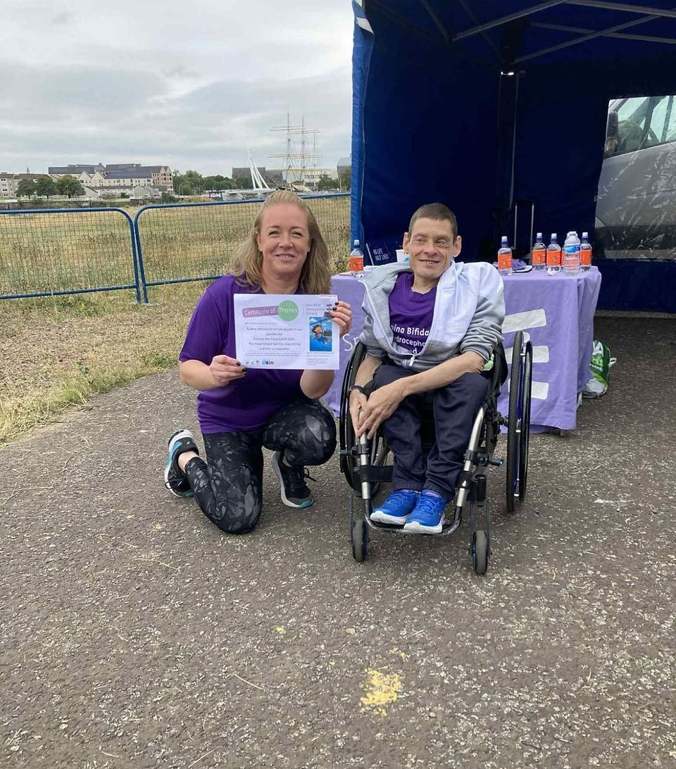 Supporters of SBH Scotland with a certificate