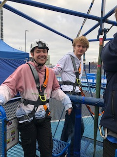 TommyInit and DanTDM harnessed up in the bungee cage ready to go