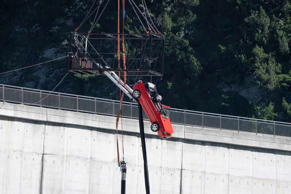 Car Bungee at the Luzzone Dam in Switzerland. The car has just been released from the cage and is about to drop 600-ft