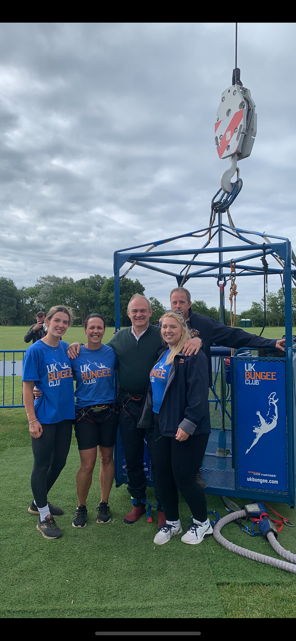 Ed Davey with Caitlin, Cassandra, Holly and Jon from UK Bungee Club, standing in front of our cage