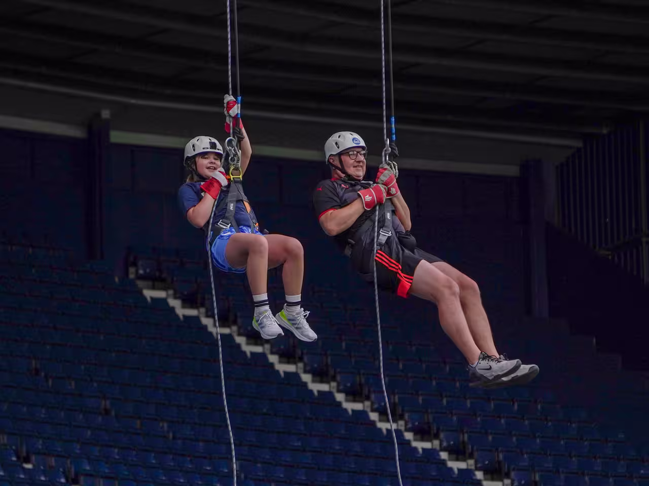 Two charity abseilers making their descent