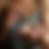 Thumbnail: Closeup of a woman using a dropper to dispense golden Thieves Essential Oil from a diffuser.