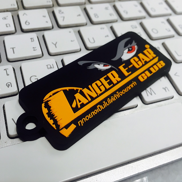 Made rubber keychains with rubber drops logo.