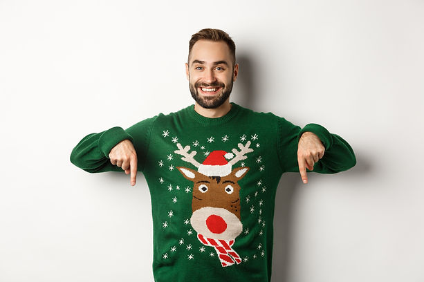 winter-holidays-christmas-handsome-smiling-man-with-beard-pointing-fingers-down-showing-pr