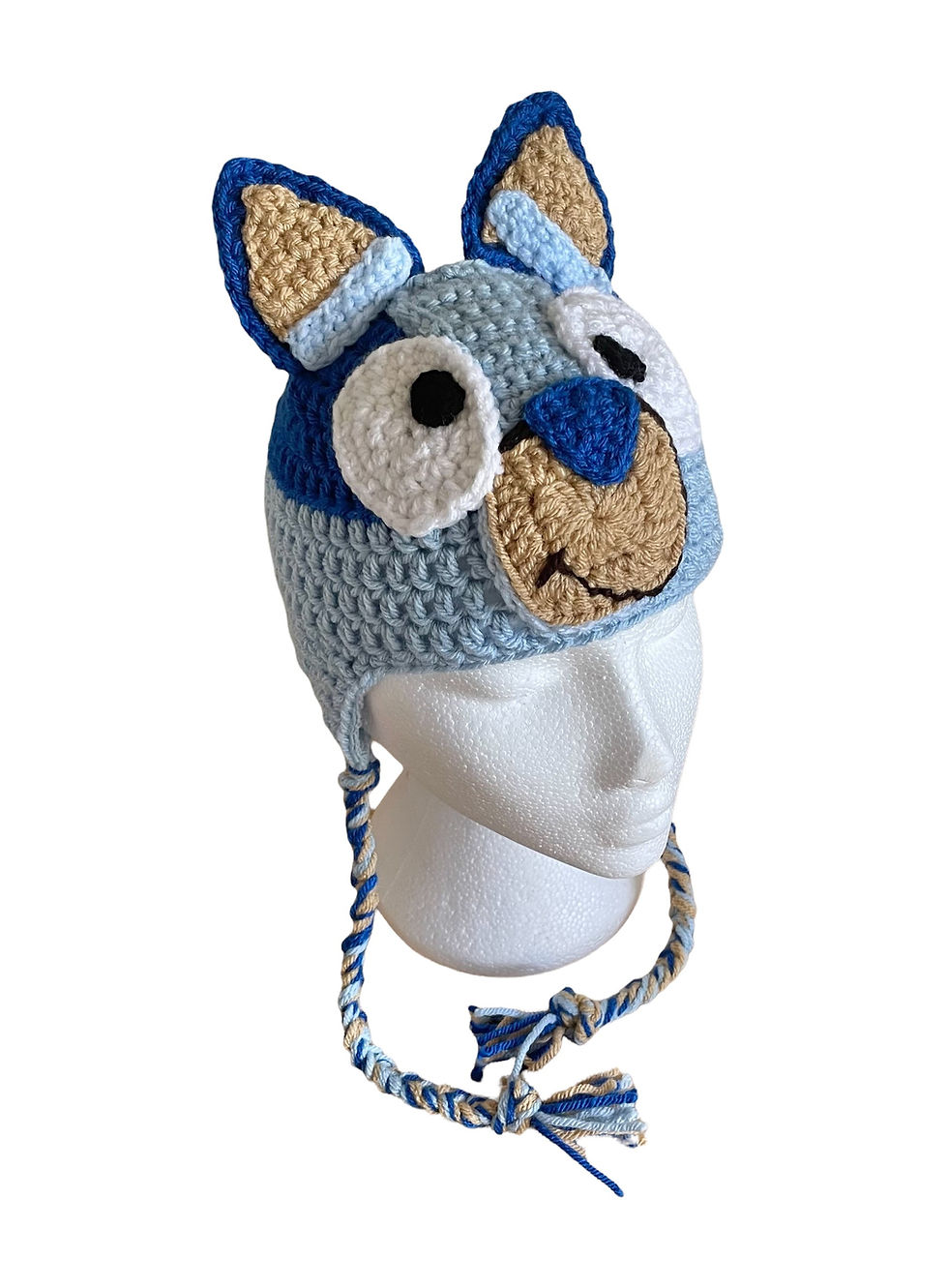 Bluey hat with earflaps and braids handmade in royal blue light blue and a caramel snout, front view