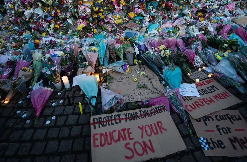Flowers, candles and signs at the Sarah Everard vigil