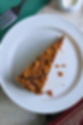 Biscoff cheesecake slice served on a white plate