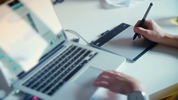 graphic-designer-working-with-drawing-ta