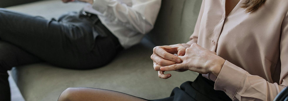 couple sitting on couch considering divorce