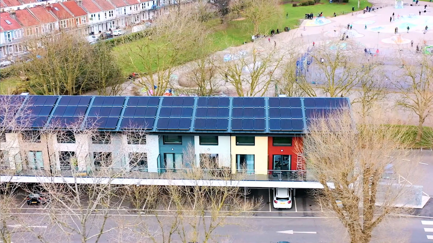 The 105 panel roof mounted photovoltaic panels generate enough energy to cover the yearly demands of residents.