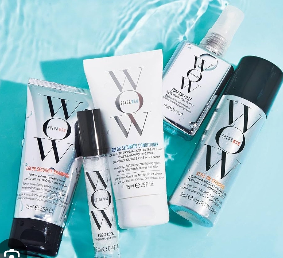 Various Color WOW hair styling products on a light blue background, WOW.