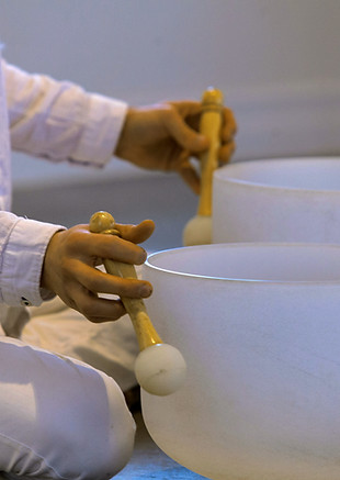 Playing-Crystal-Singing-Bowls_edited.jpg