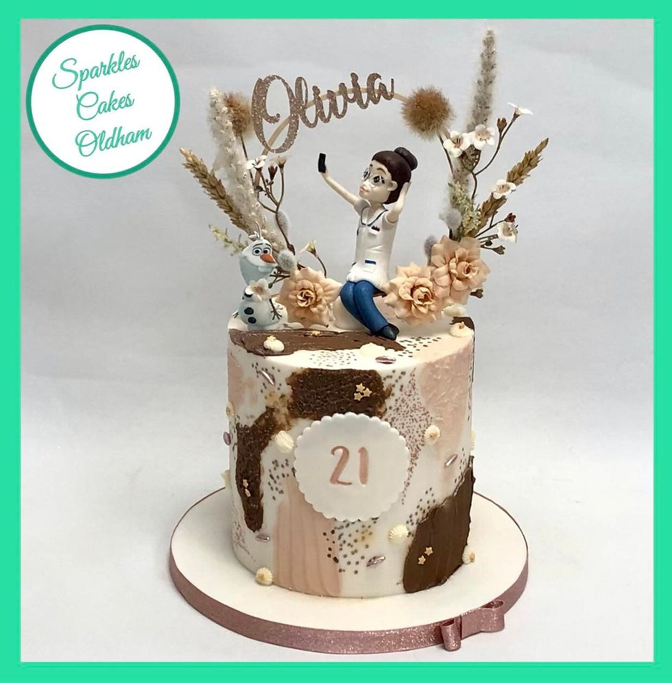 Shades of nude with silk and dried flowers wreath tall birthday cake with handmade model