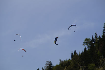 Paragliders in Sky