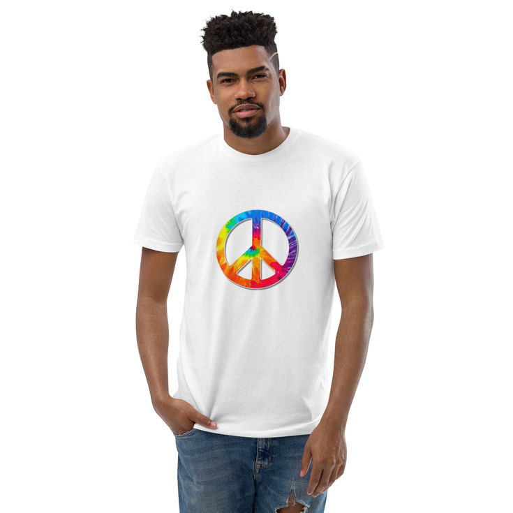 Man wearing white t-shirt with colorful psychedelic peace sign graphic.