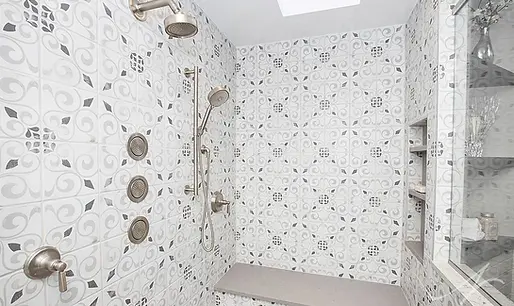 Luxury bathroom with soaking tub and double vanities by TW General Contracting in Short Pump VA