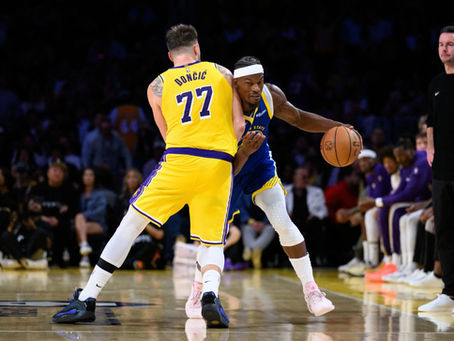 Butler leads way as Warriors edge LeBron-less Lakers in NBA season opener