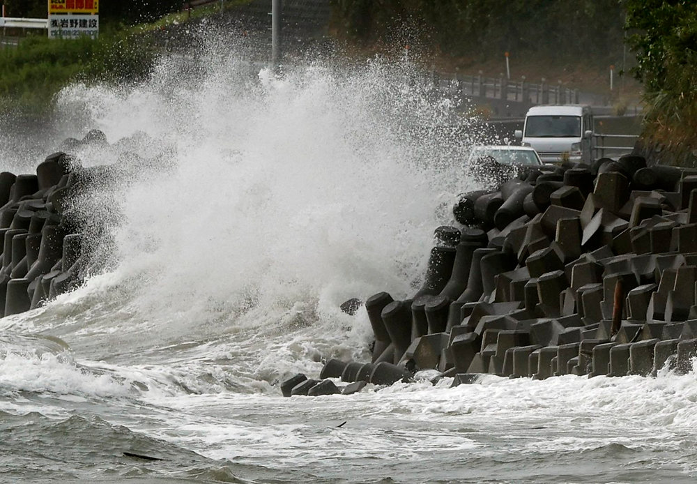 Typhoon unleashes rain, strong winds in southern Japan