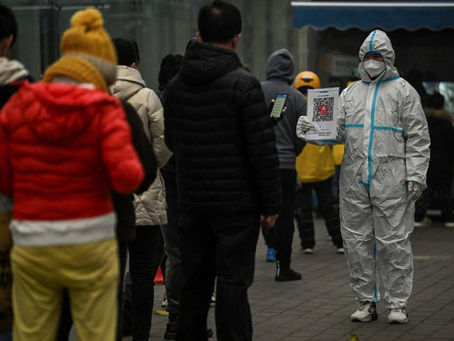 China reports more Covid deaths as infections surge