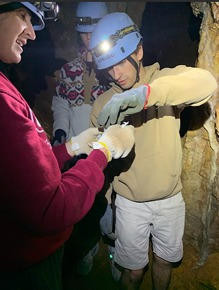 Max mixing swabbed cave wall into phosphate buffer saline