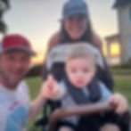 Adam, his wife, and son. Adam is an owner of Precision Exteriors