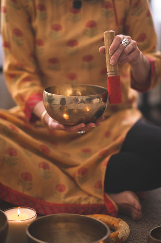 Rachel playing Tibetan bowl 