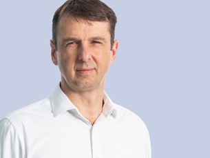 Costain makes more from less