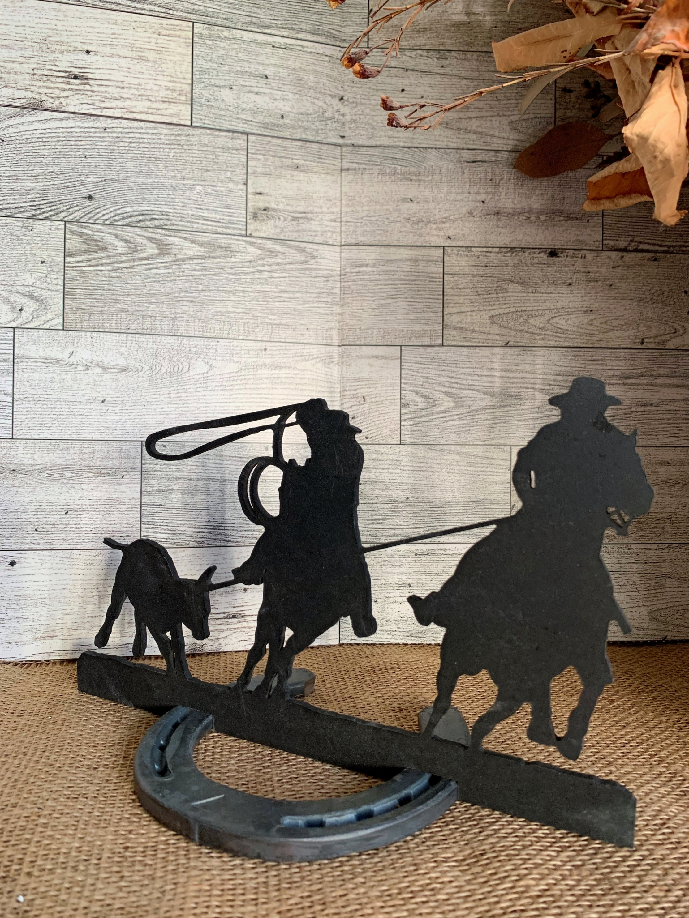 Team Roping With Horseshoe Stand