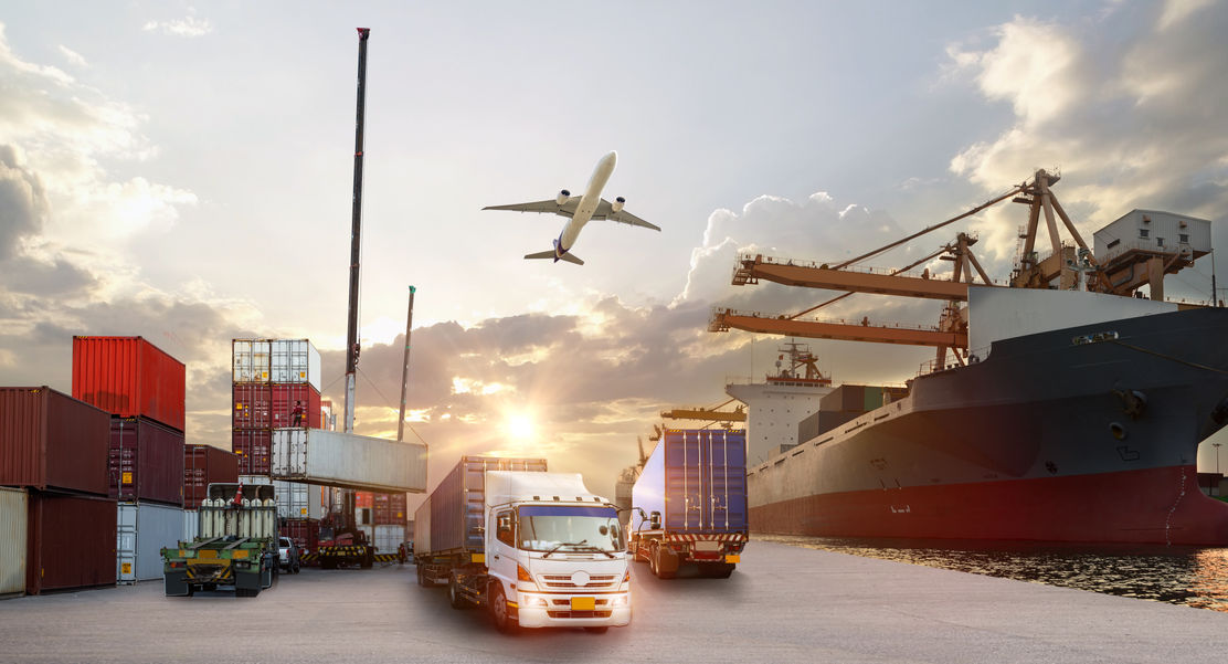 Container truck in ship port for business Logistics and transportation of Container Cargo