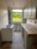 Kitchen structural alterations and cabinet installation.