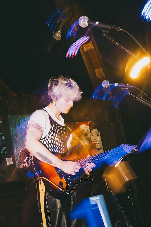 Fish Teeth Tim's Tavern by Nat Silva blue yellow light.JPEG