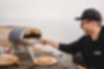 cooking pizza on the beach in sussex with the roccbox pizza oven