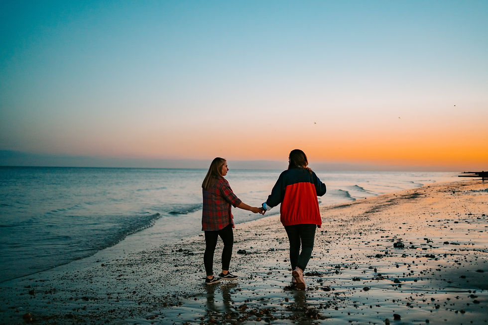 couple on worthing beach, West Sussex wedding photographer