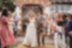 confetti thrown at the bride and groom at village hall wedding in sussex