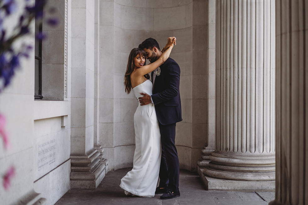 bride and groom outside Marylebone town hall London wedding