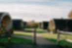 the wooden pods accommodation at Kingscote barn wedding venue