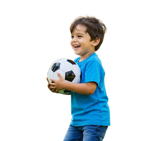 A cheerful boy stands in a park, gripping a bright ball, excited for outdoor playtime.