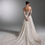 Thumbnail: high end lace mermaid bridal gown with train in Orange County bridal shop