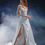 Thumbnail: Strapless bridal gown with beaded corset bodice, pearl shoulder straps, and a high-slit satin skirt.