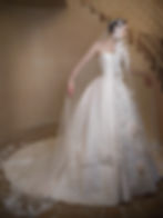 satin ball gown wedding dress with floral appliqués