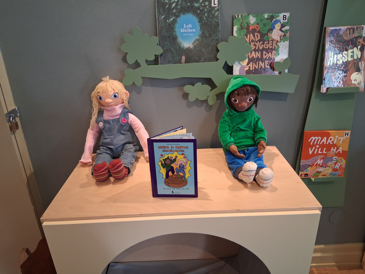 Castor och Benita, dockorna och boken