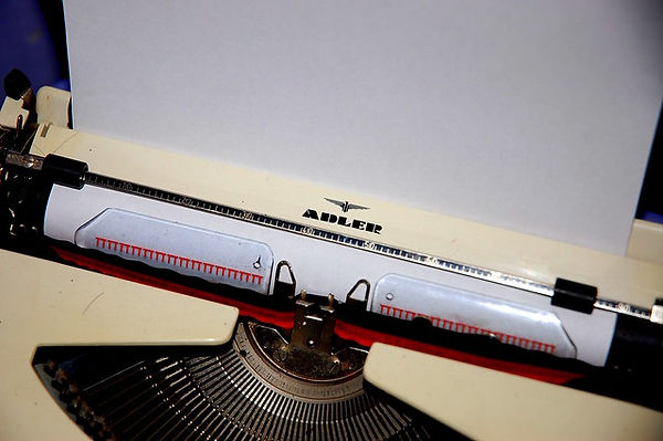 adler white typewriter.jpeg