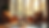 Eye-level view of a cozy living room with two empty chairs and a coffee table