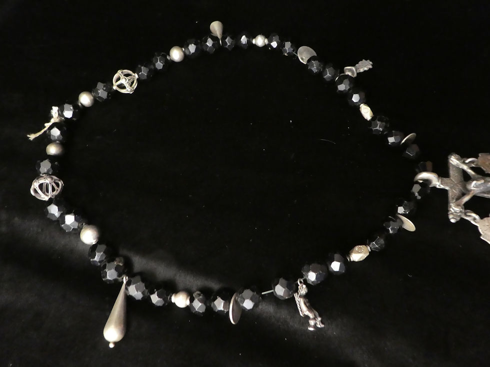 Thumbnail: Silver and black chachale necklace.