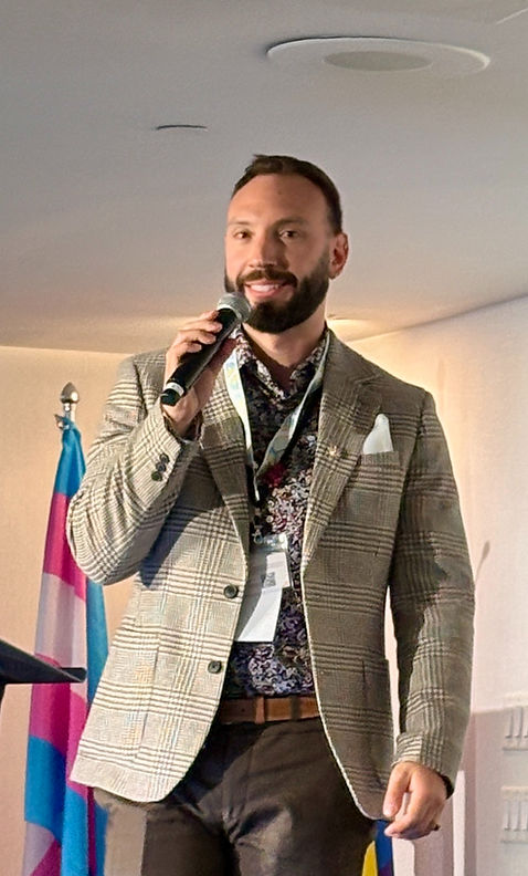 Giovanni (Gio) Arcuri, OT, MSc delivering a conference presentation at the International E